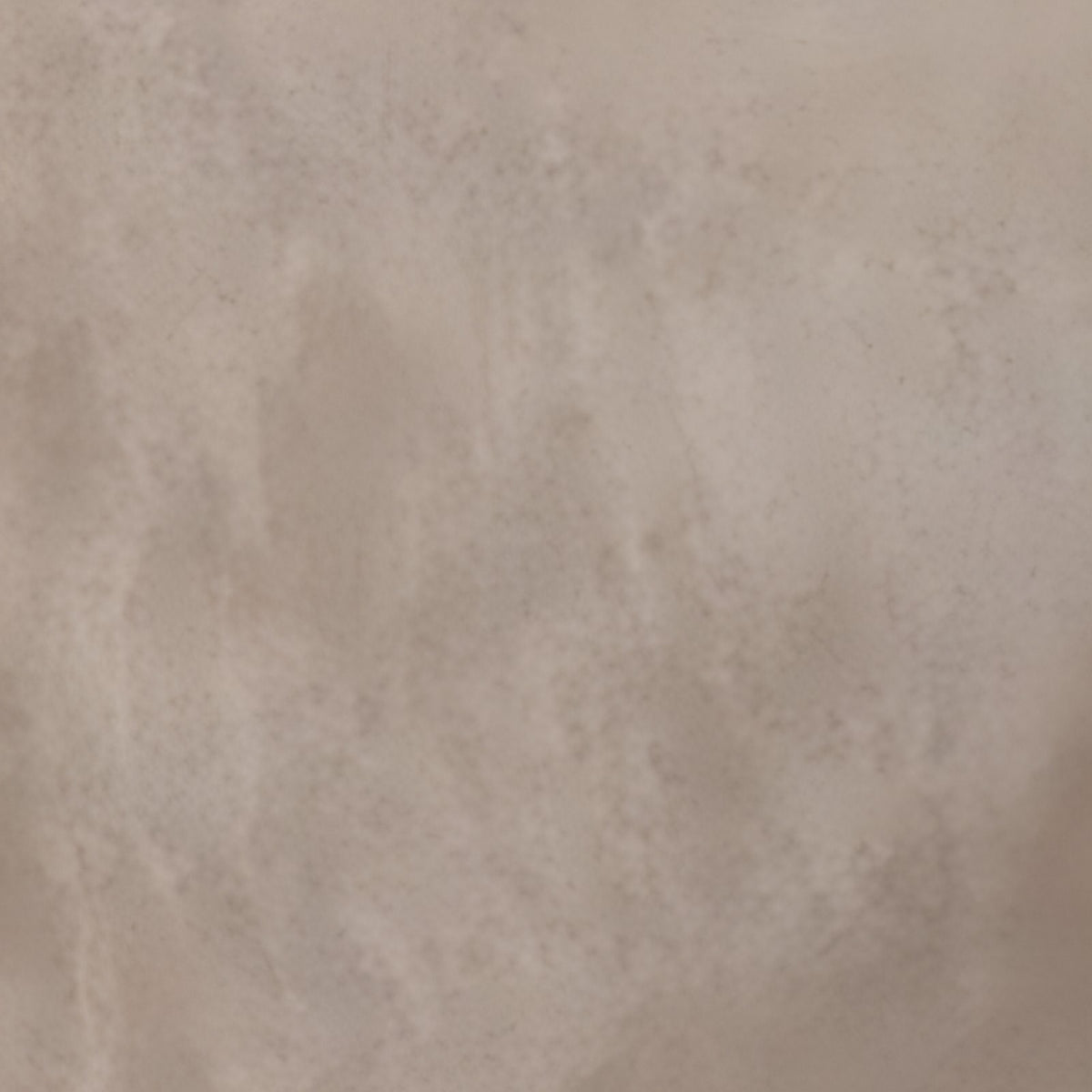 Gros plan sur le motif Matière minérale beige, environ 20 cm de large
