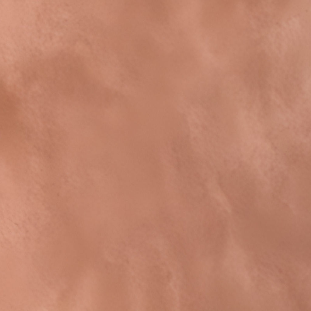Gros plan sur le motif Matière minérale terracotta, environ 20 cm de large